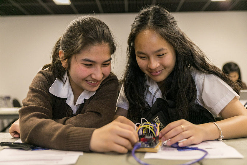 High Schoolers Playing with Circuit